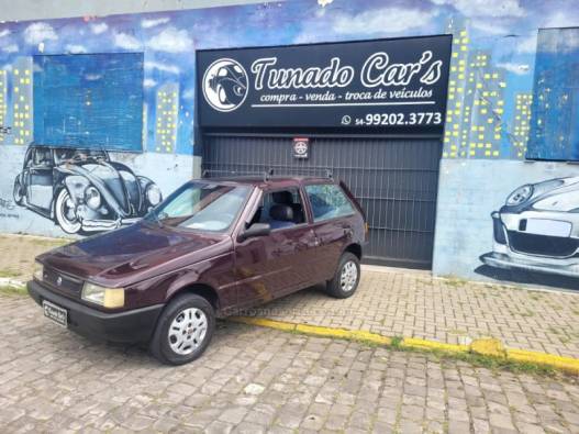 FIAT - UNO - 2002/2002 - Grená - R$ 12.500,00